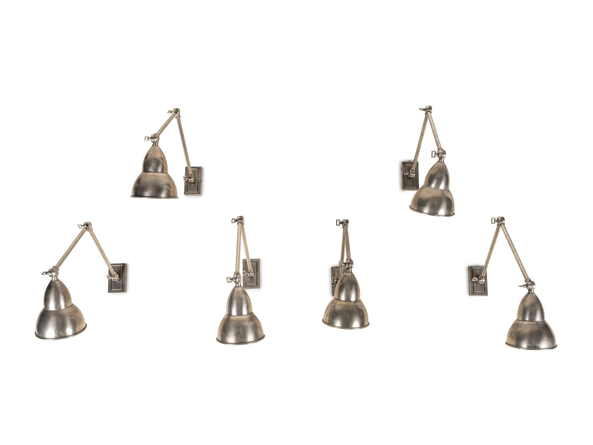 A Set of Six Swing-Arm Wall Lights