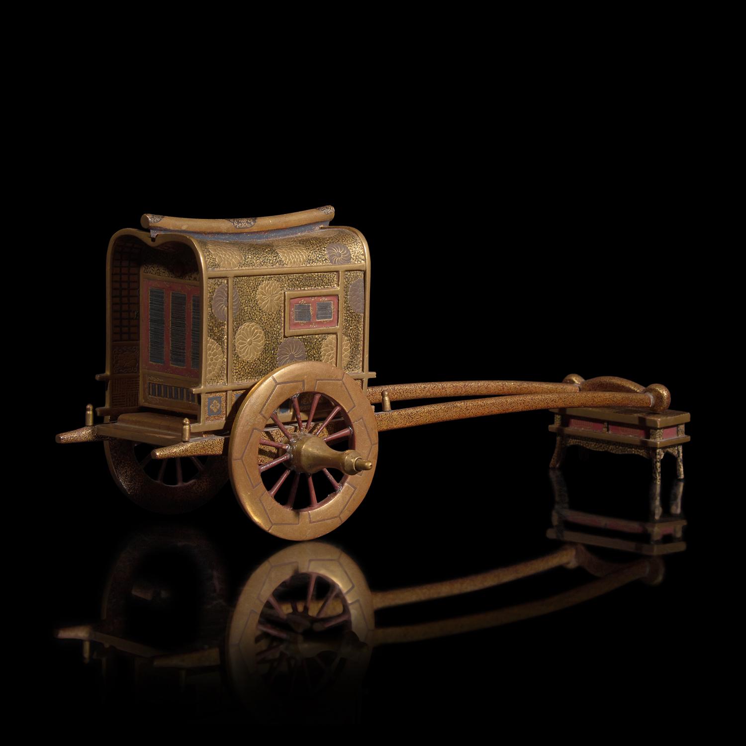 A Japanese Gilt Lacquer Carriage-Form Koro with Stand, Meiji Period