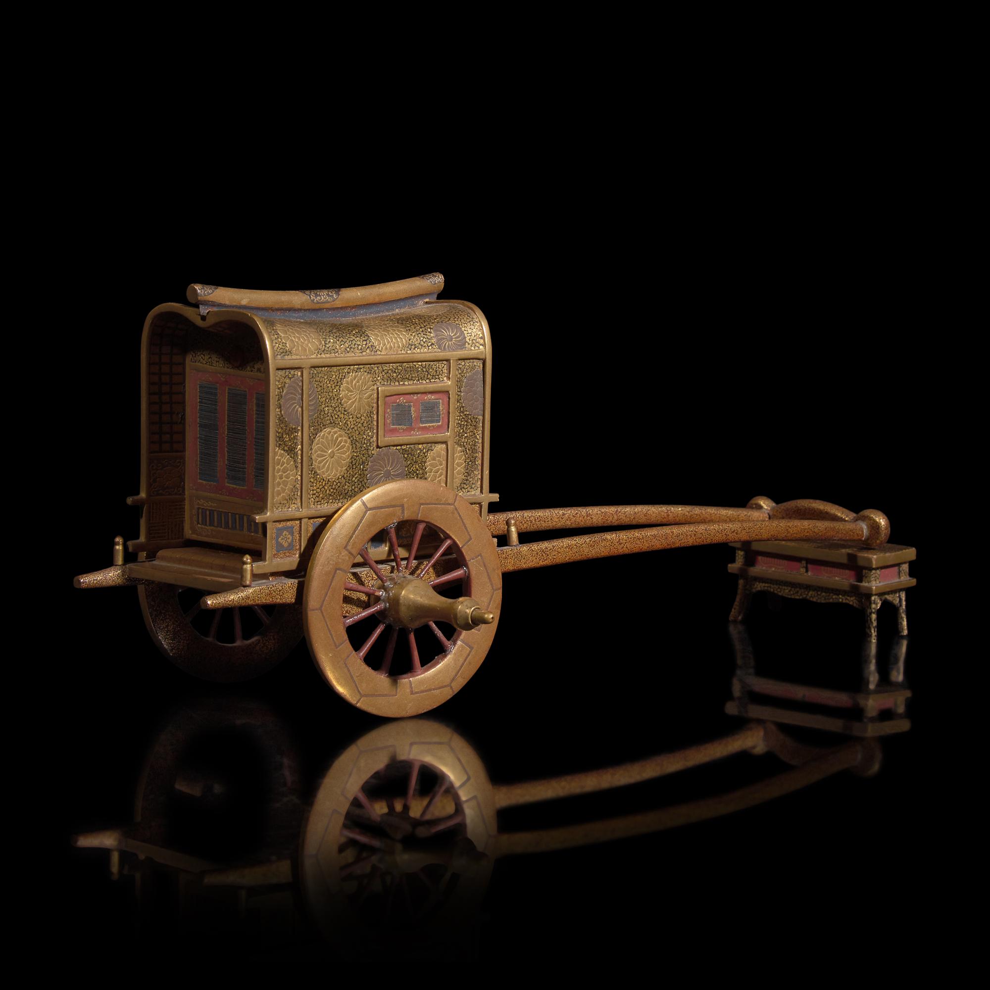 A Japanese Gilt Lacquer Carriage-Form Koro with Stand, Meiji Period