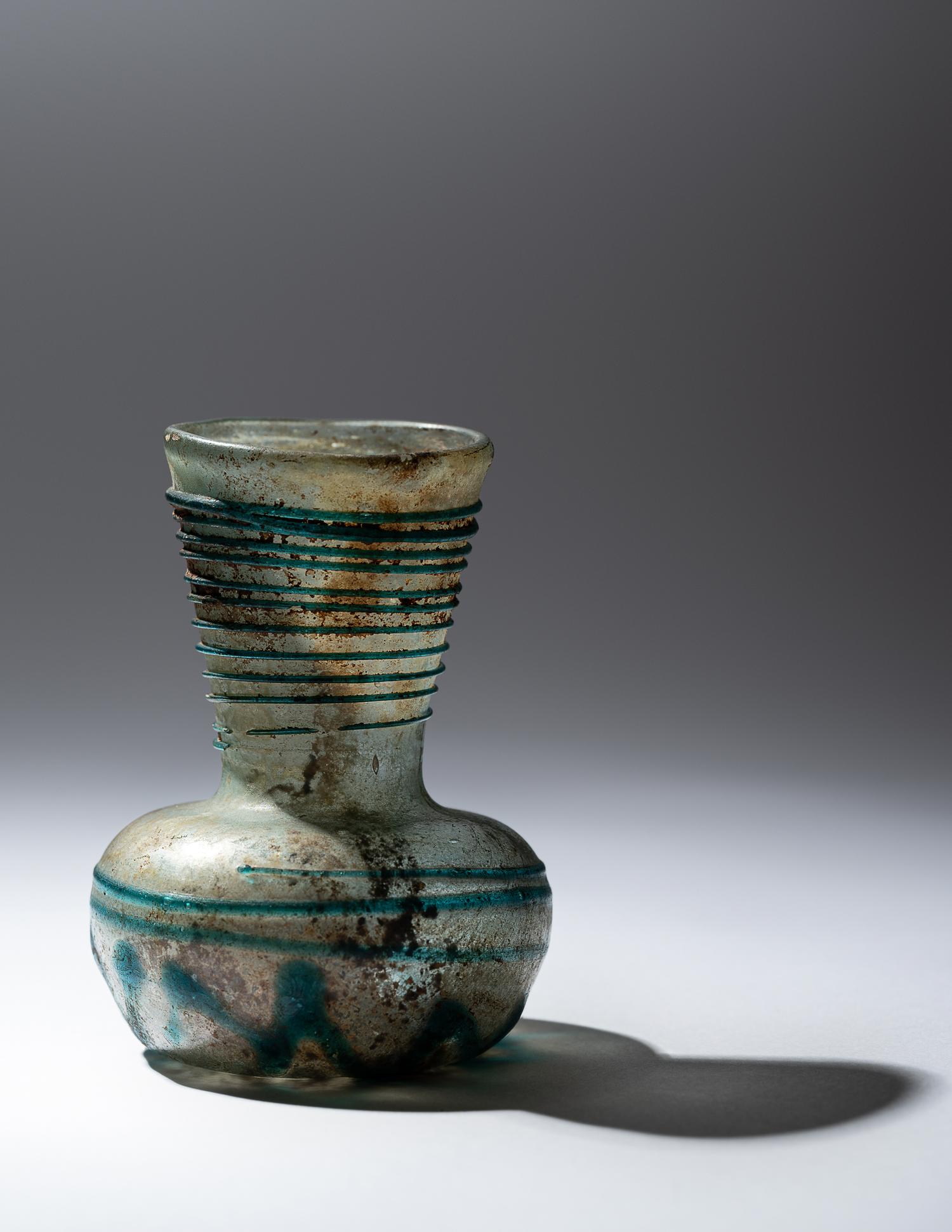 A Roman Pale Blue Glass Bottle