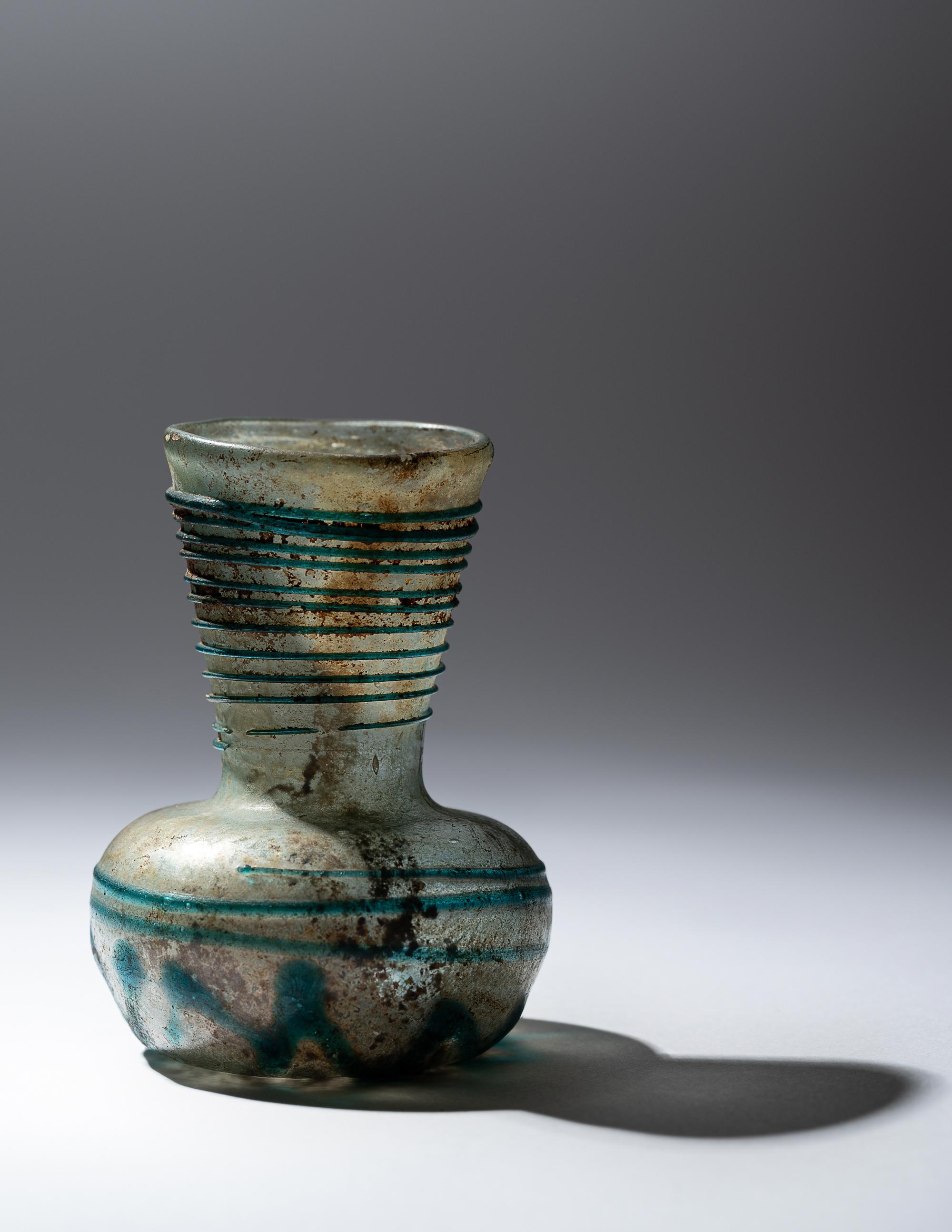 A Roman Pale Blue Glass Bottle