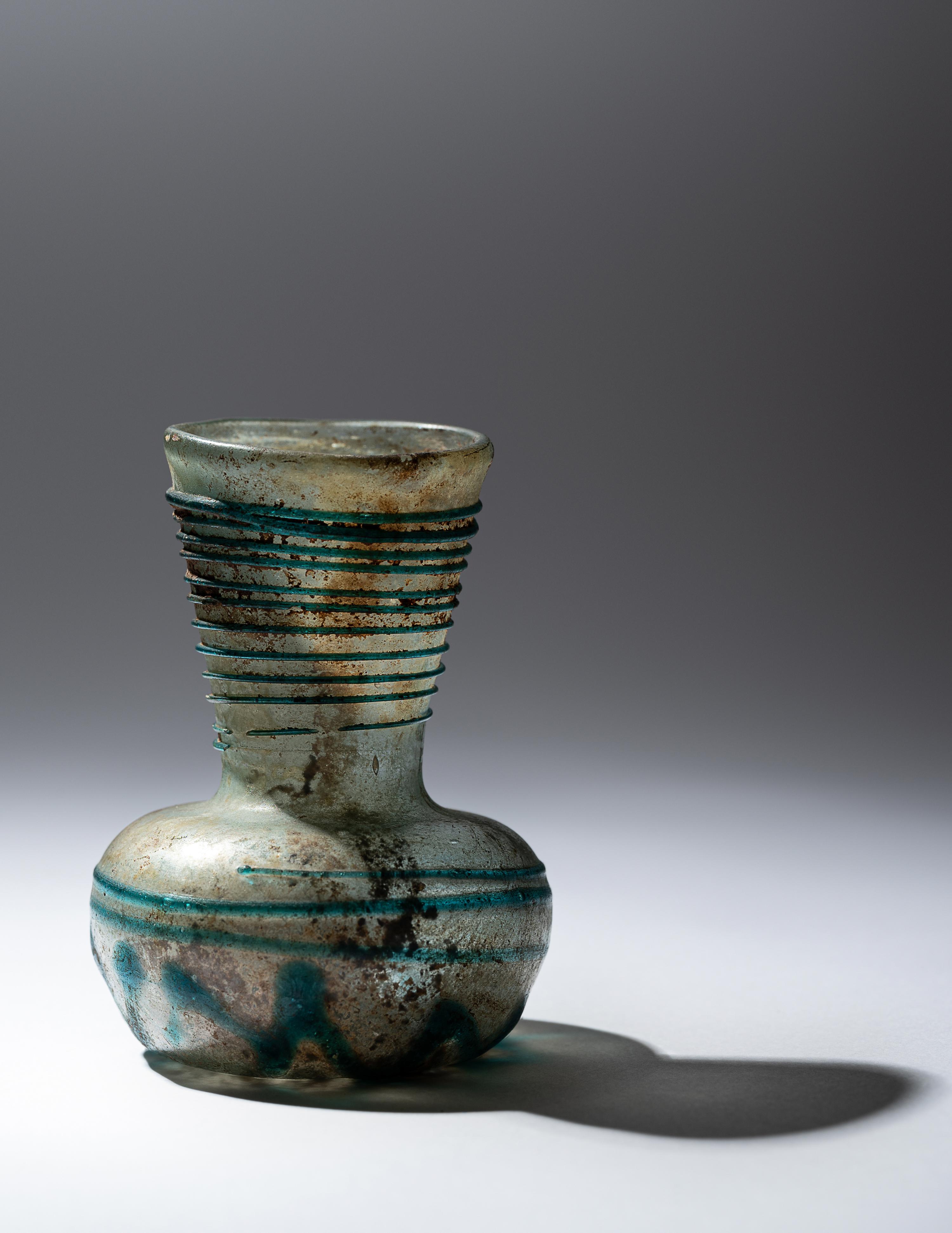 A Roman Pale Blue Glass Bottle