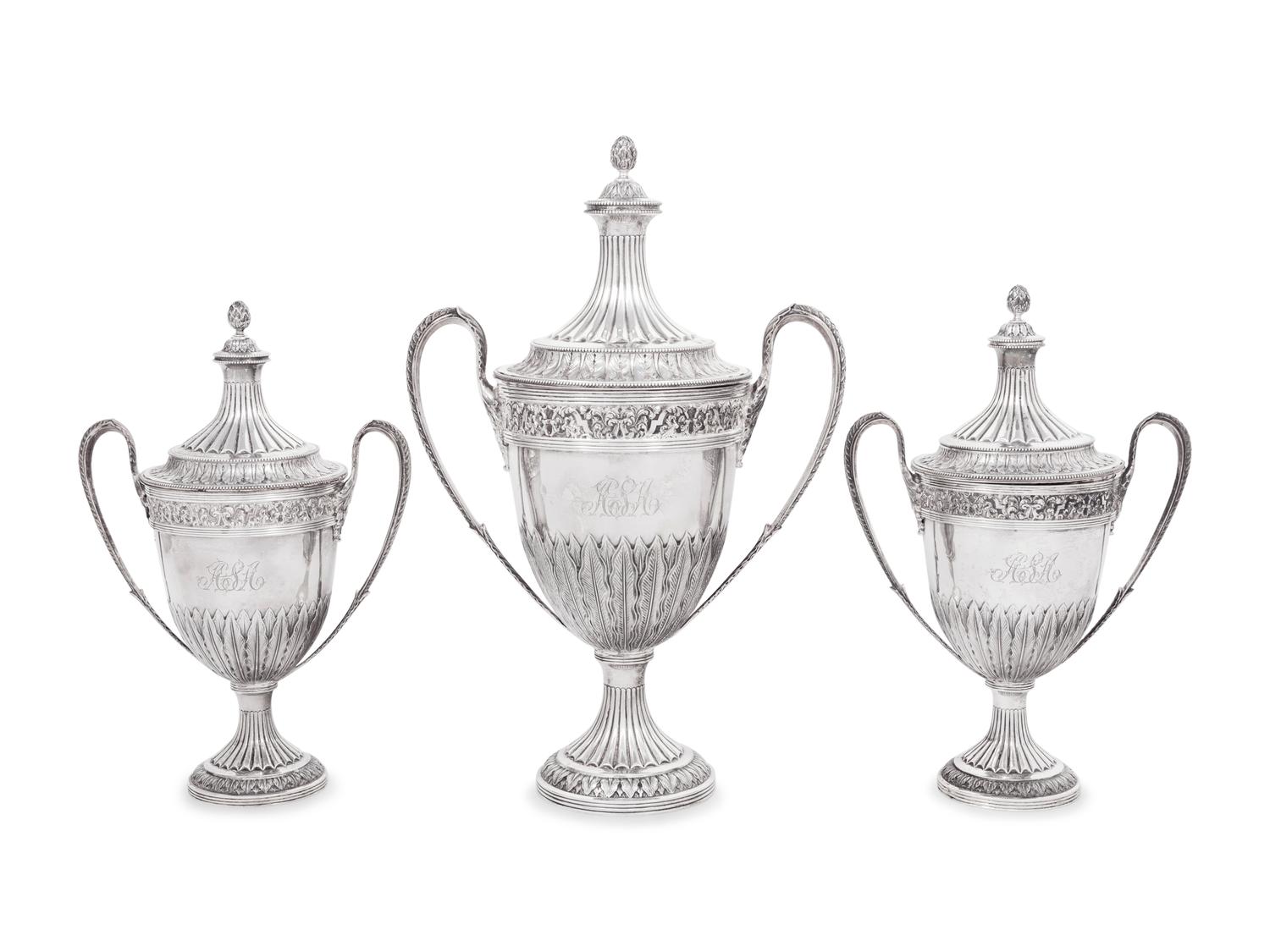 A Set of Three English Silver Covered Urns