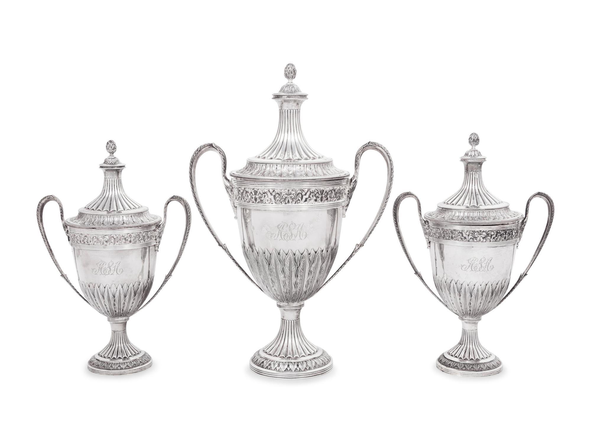 A Set of Three English Silver Covered Urns