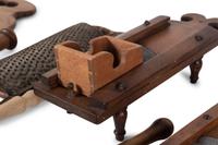 A Group of Wood and Tin Graters, Slicers and Pounders