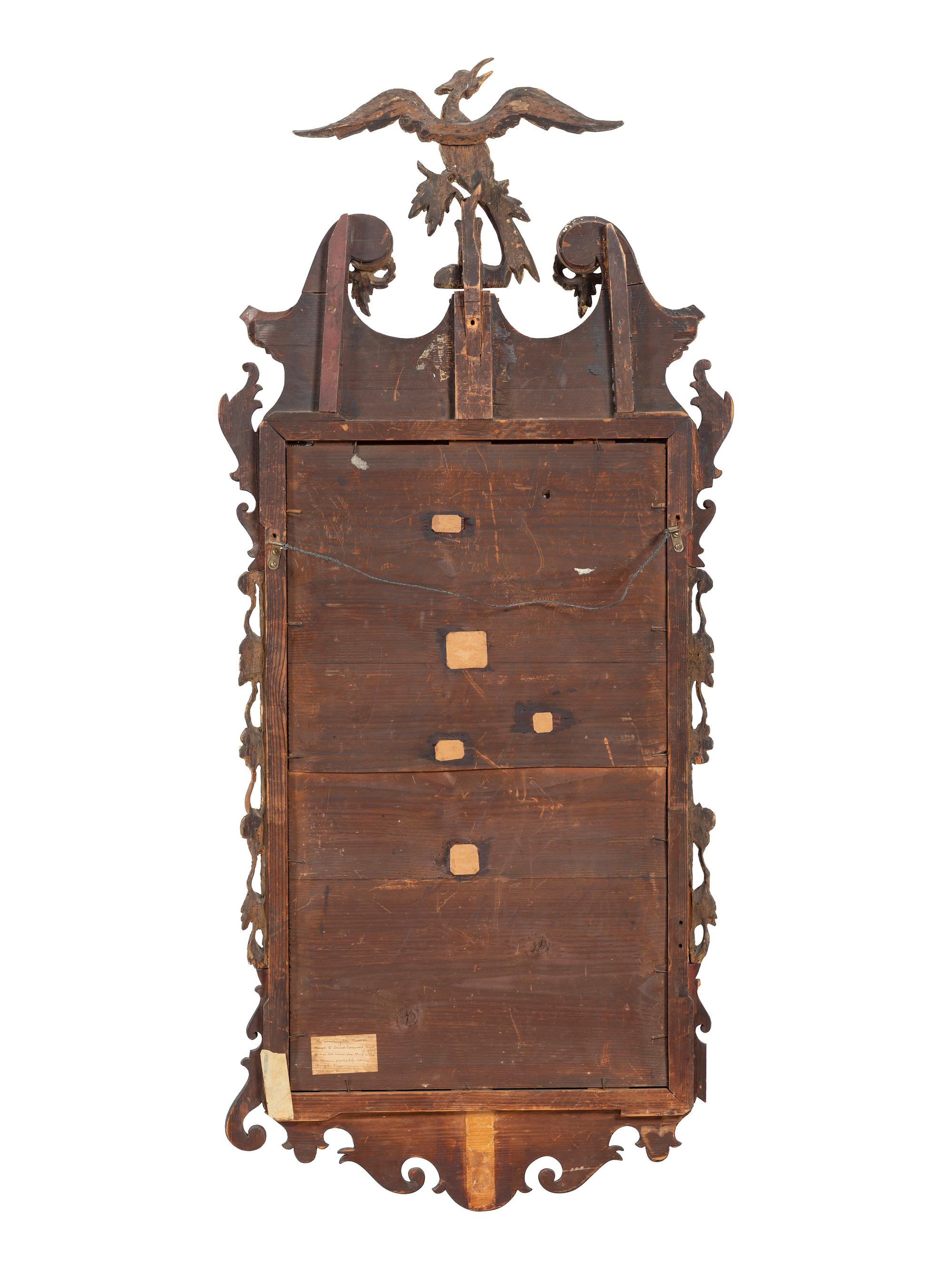 A Chippendale Parcel Gilt and Carved Mahogany Looking Glass