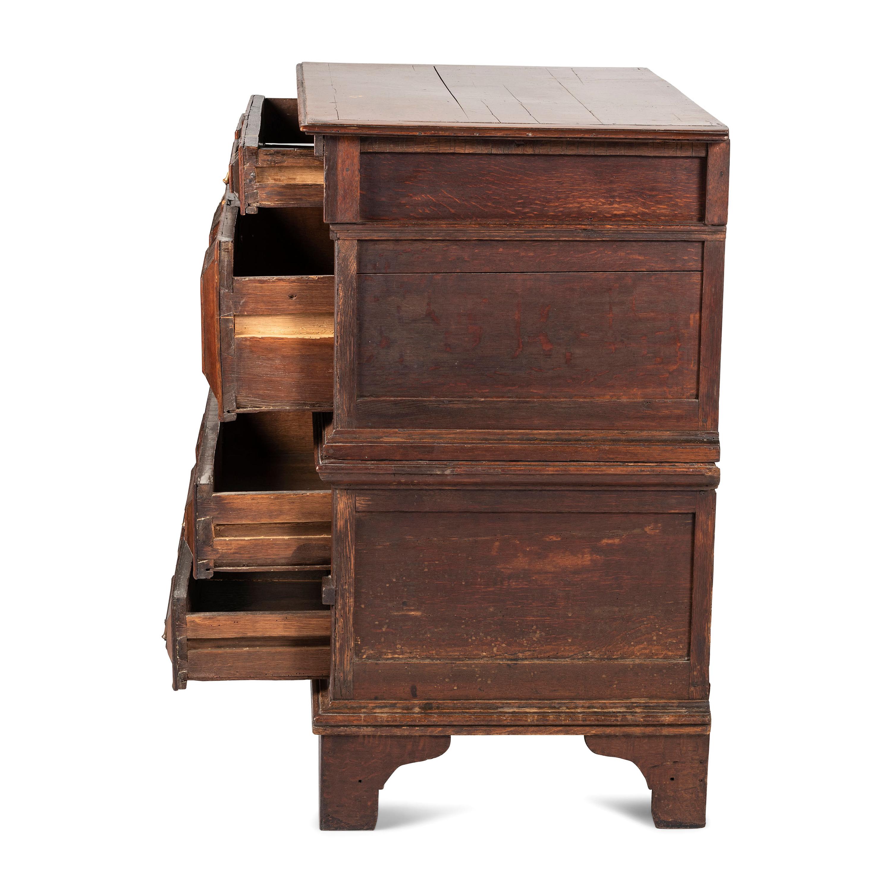 A Charles II Carved Oak Chest of Drawers