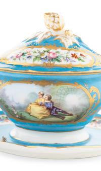 A Pair of Sèvres Style Porcelain Tureens and Underplates