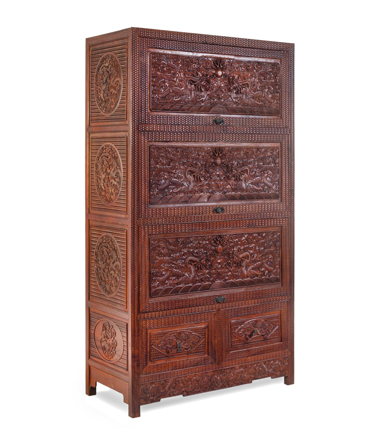 A Carved Huanghuali 'Dragon' Cabinet