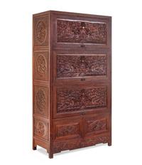 A Carved Huanghuali 'Dragon' Cabinet