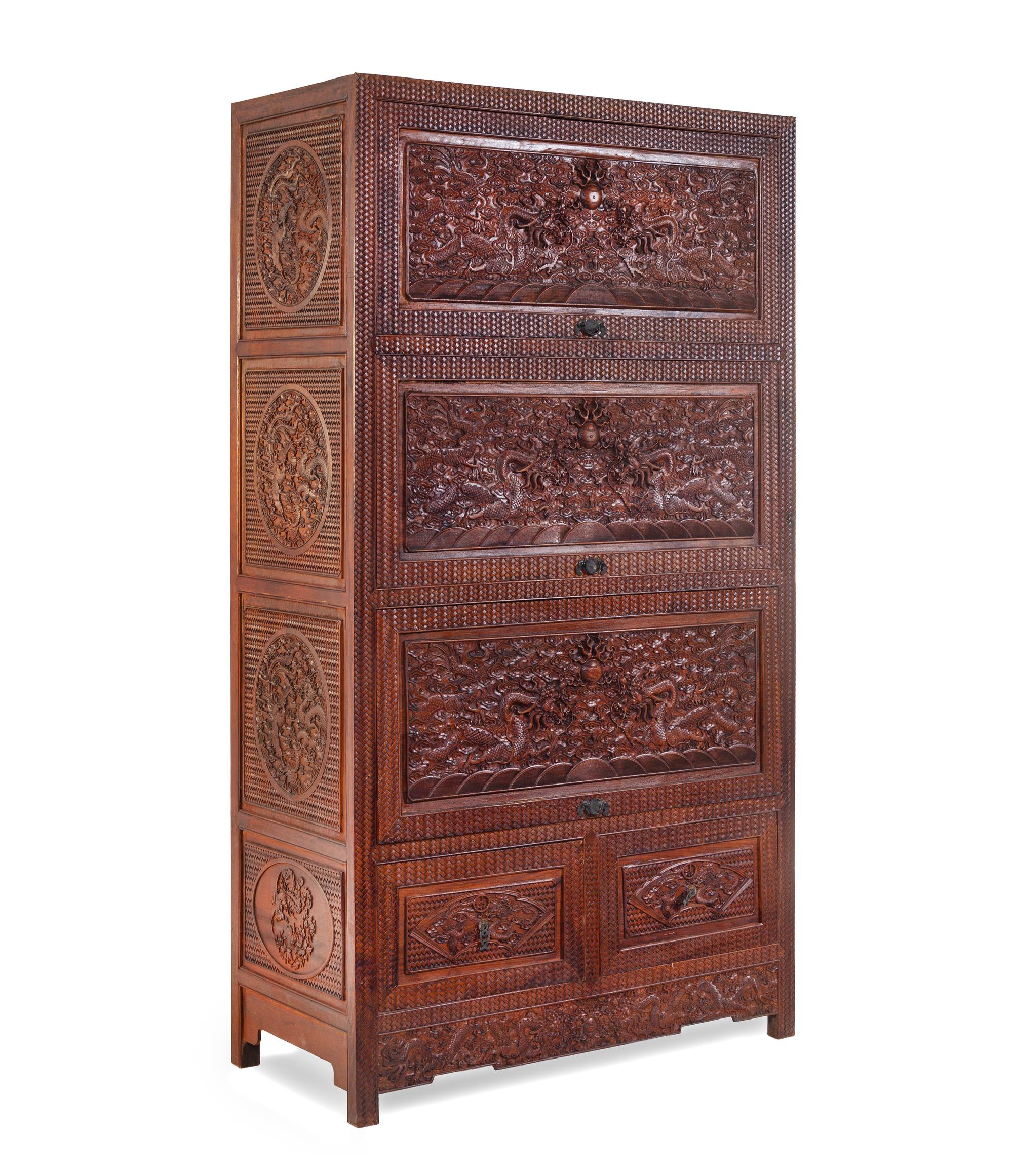 A Carved Huanghuali 'Dragon' Cabinet