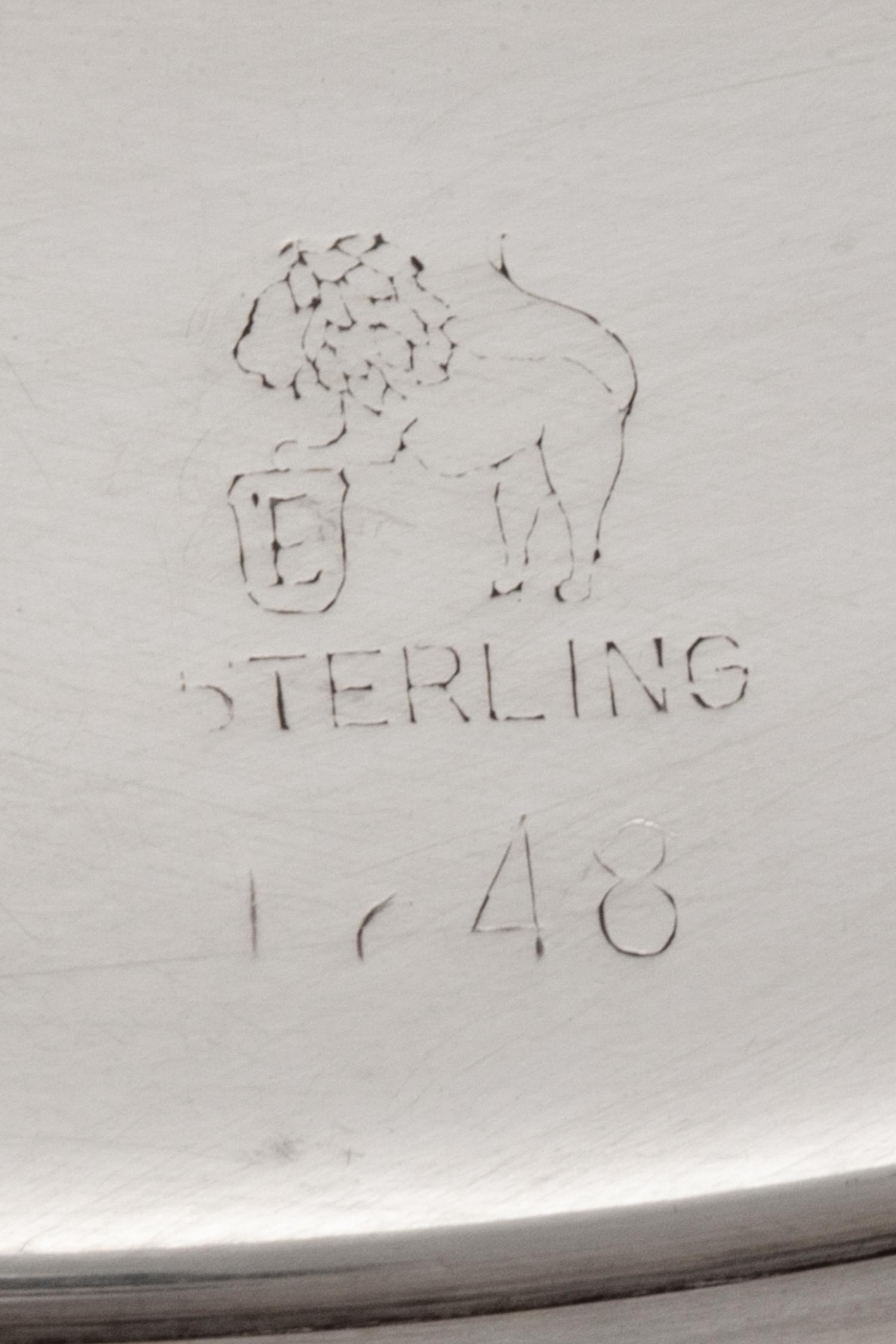 A Set of Twelve American Silver Bread Plates