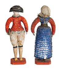 A Pair of French Carton Moule "Seaside" Dolls