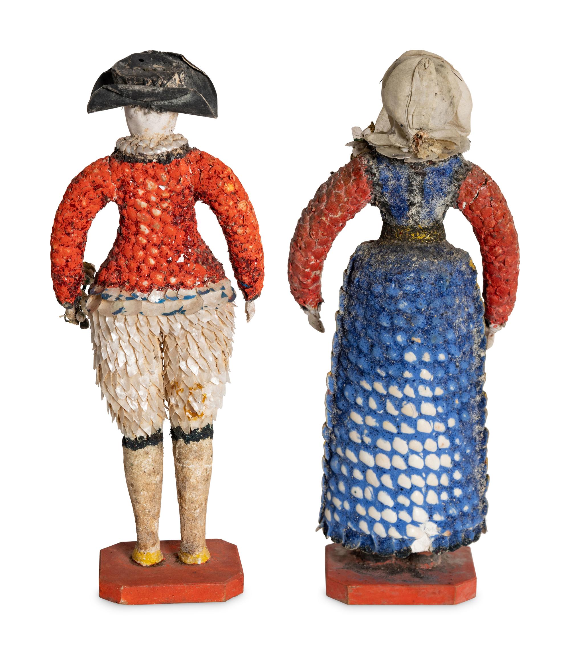 A Pair of French Carton Moule "Seaside" Dolls