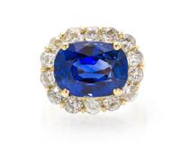 A Fine 18 Karat Yellow Gold, Sapphire and Diamond Ring, 7.90 dwts.