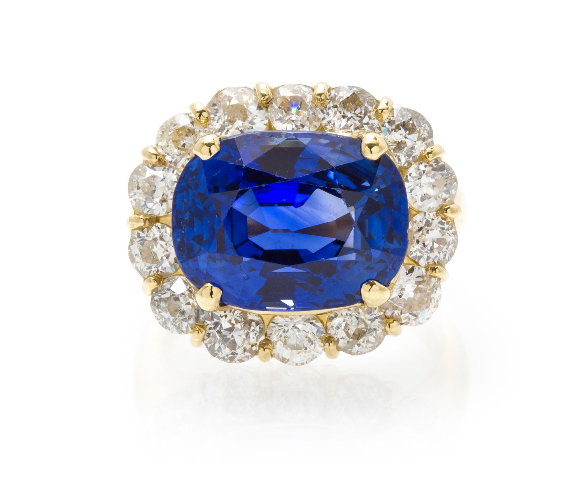 A Fine 18 Karat Yellow Gold, Sapphire and Diamond Ring, 7.90 dwts.