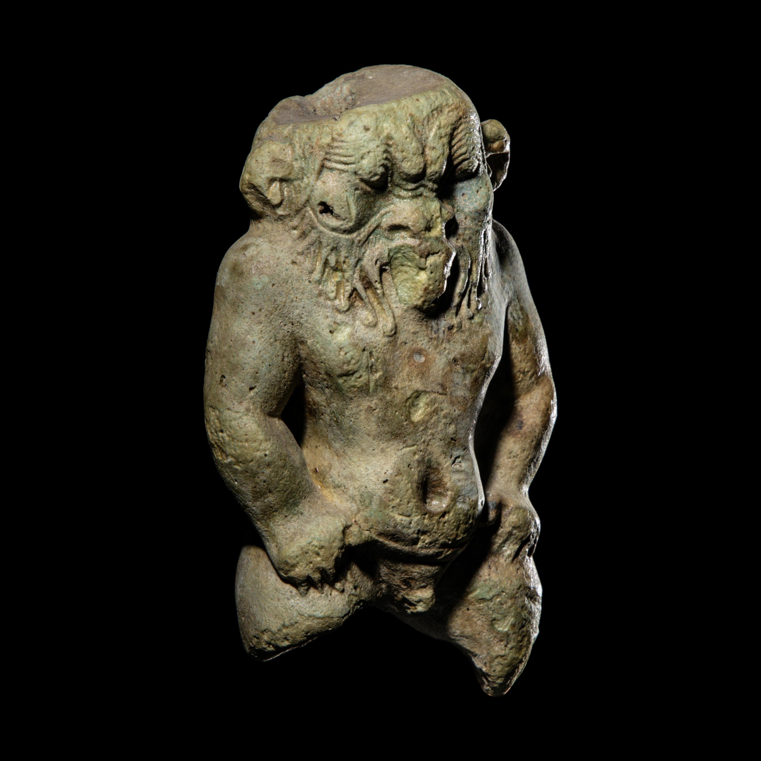 An Egyptian Faience Bes