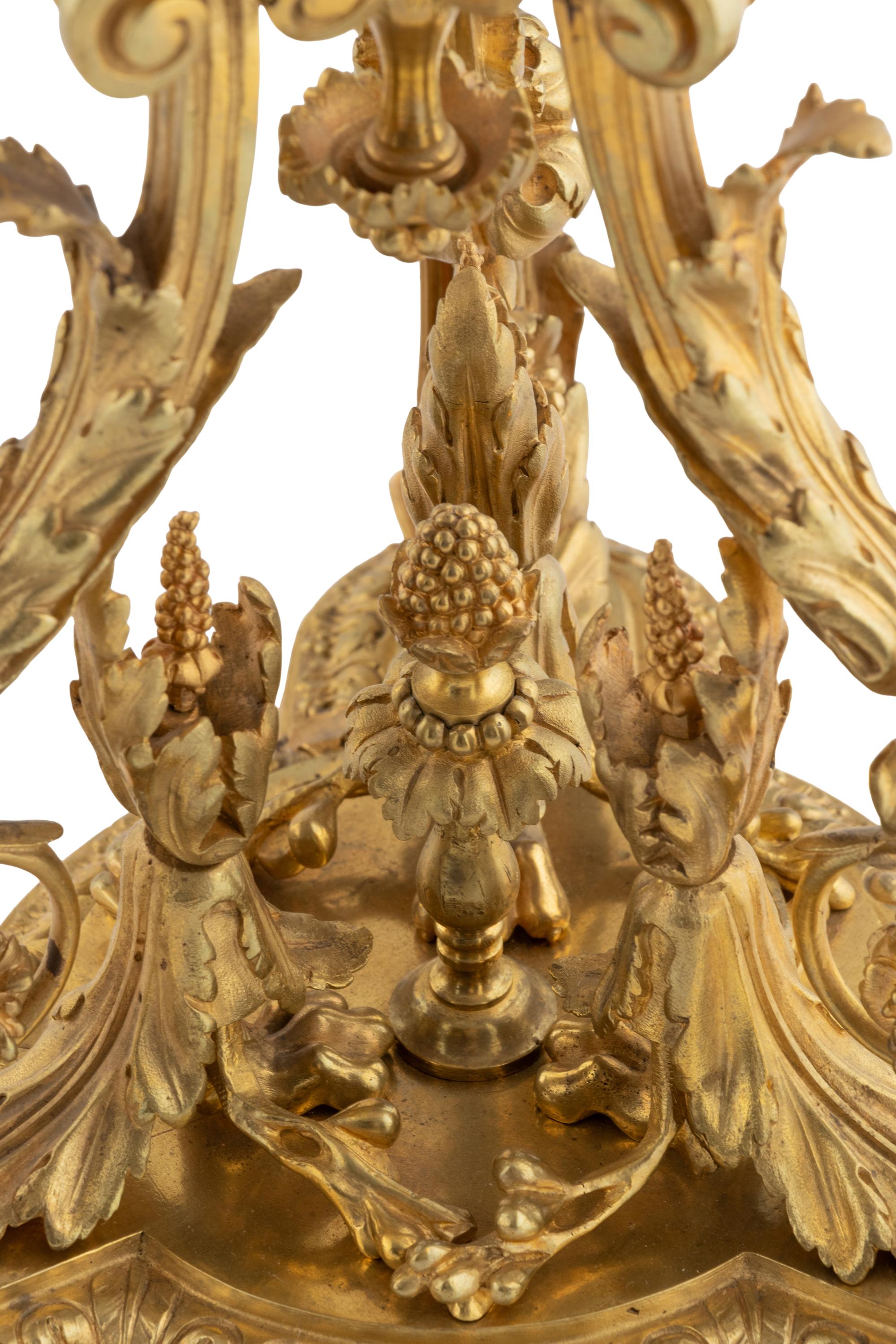 A Pair of Louis XVI Style Gilt Bronze and Marble Six-Light Candelabra