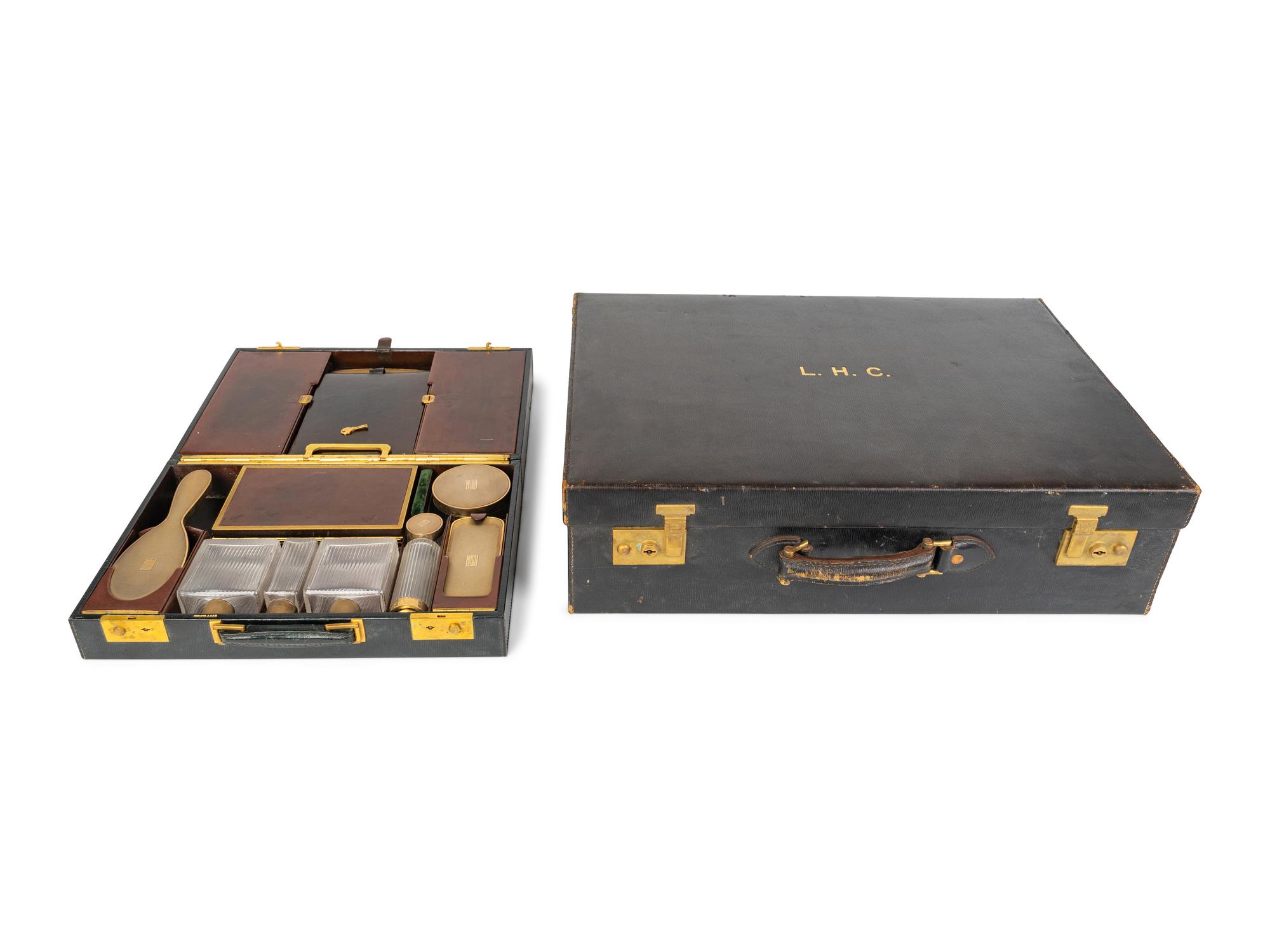 An Asprey Leather-Mounted Travel Case and a Cross Travel Case — SECOND QUARTER 20TH CENTURY