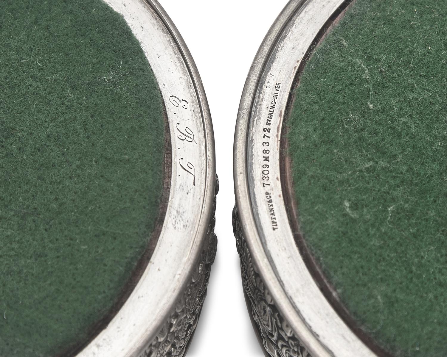 A Pair of Sterling Silver Floral Repousse Wine Coasters, Tiffany & Co., New York, NY, Circa 1880