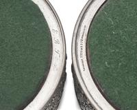 A Pair of Sterling Silver Floral Repousse Wine Coasters, Tiffany & Co., New York, NY, Circa 1880
