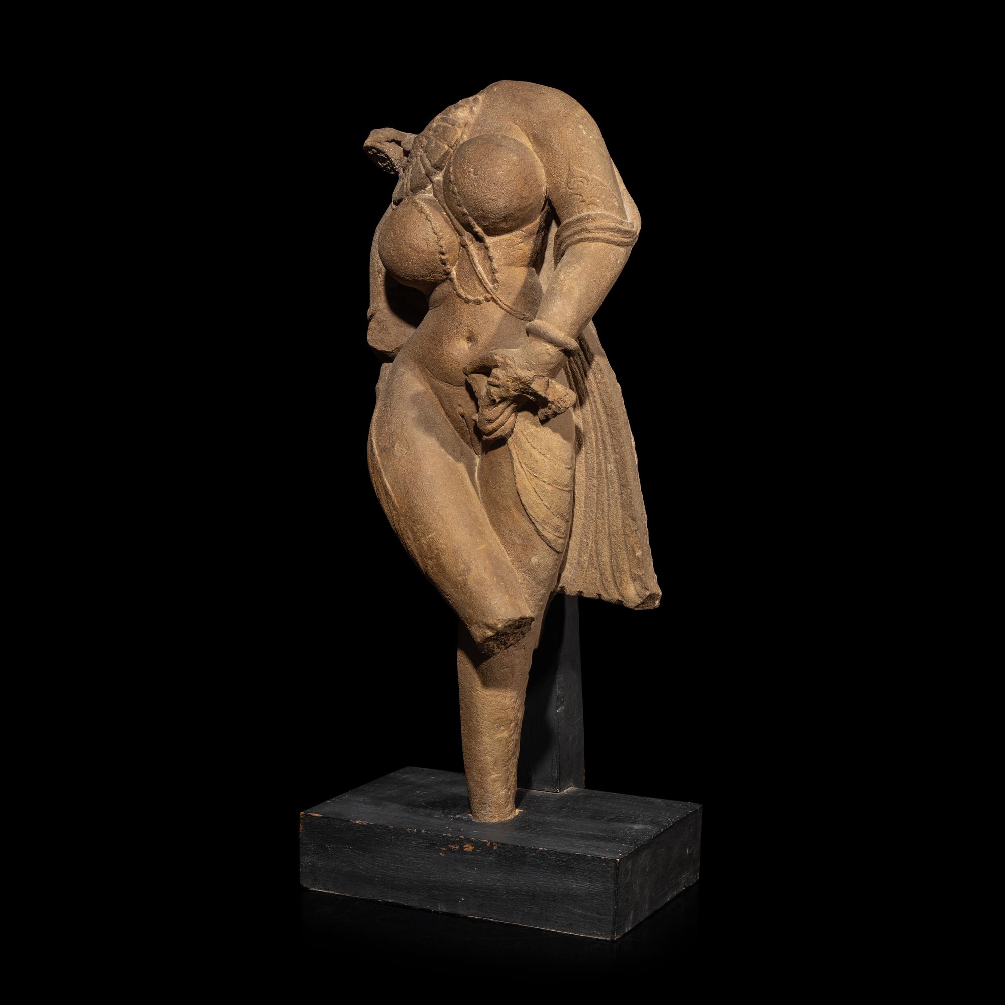 An Indian Sandstone Torso of a Goddess, 12th Century 十二世紀 印度砂岩女神像