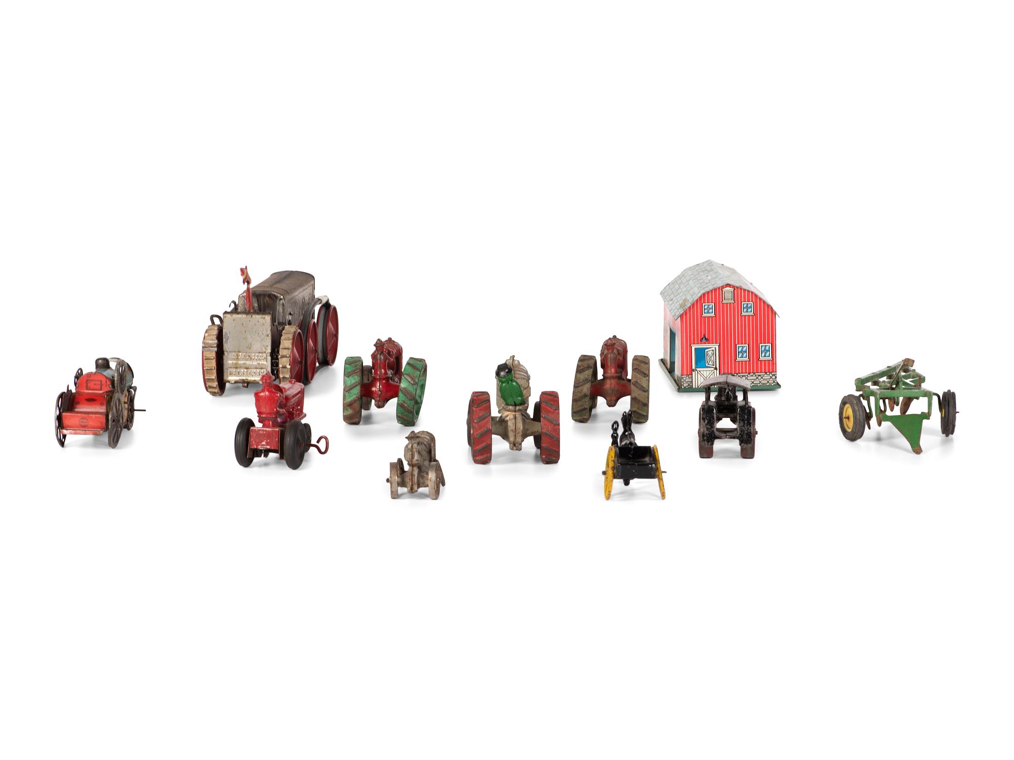 Eleven Metal Tractors and Other Farm Toys