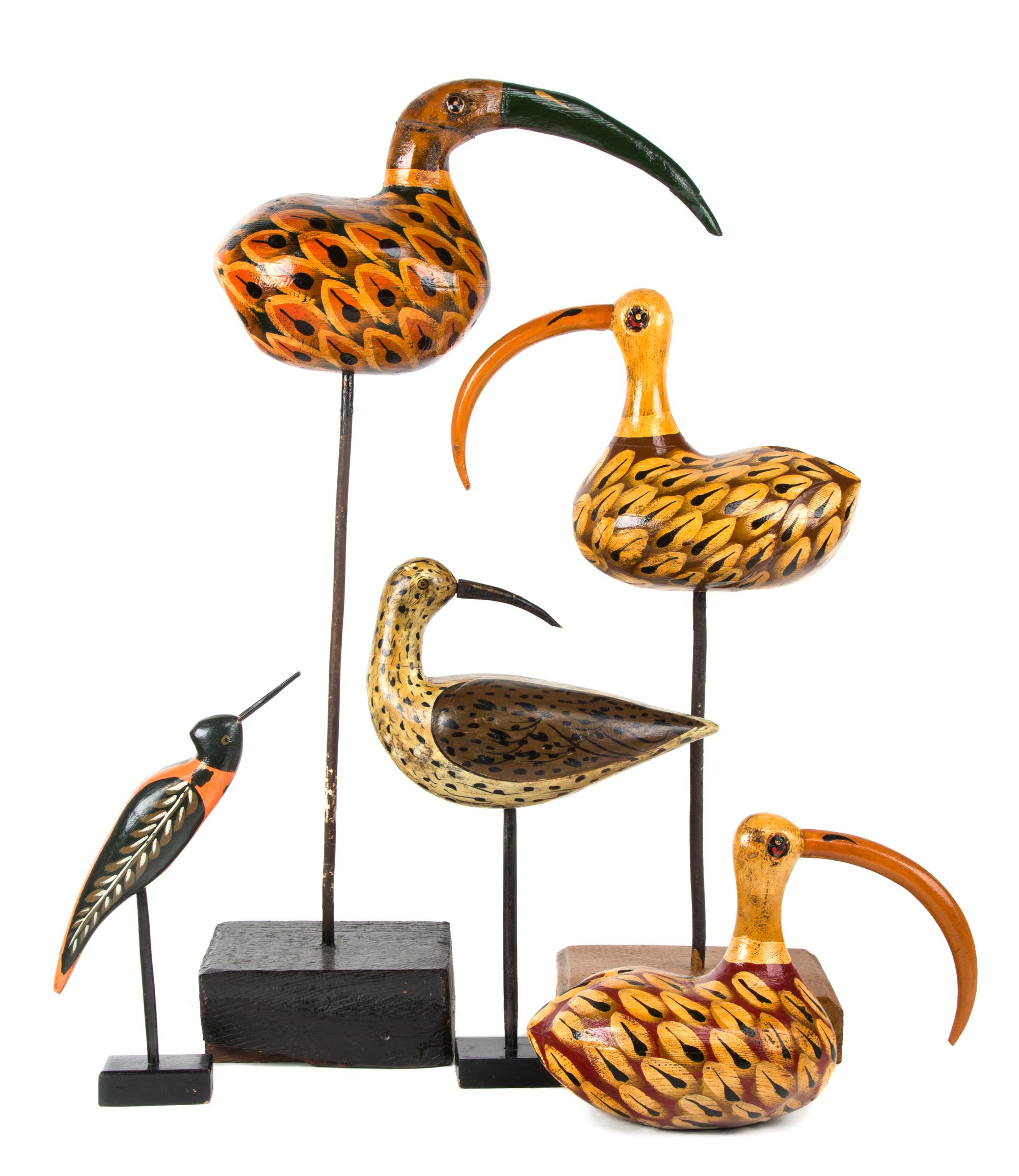 Five Painted Wood Figures of Birds Height of tallest 30 inches.