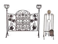 A French Wrought Iron Fire Screen with Posset Cup Holders and a Set of Tools