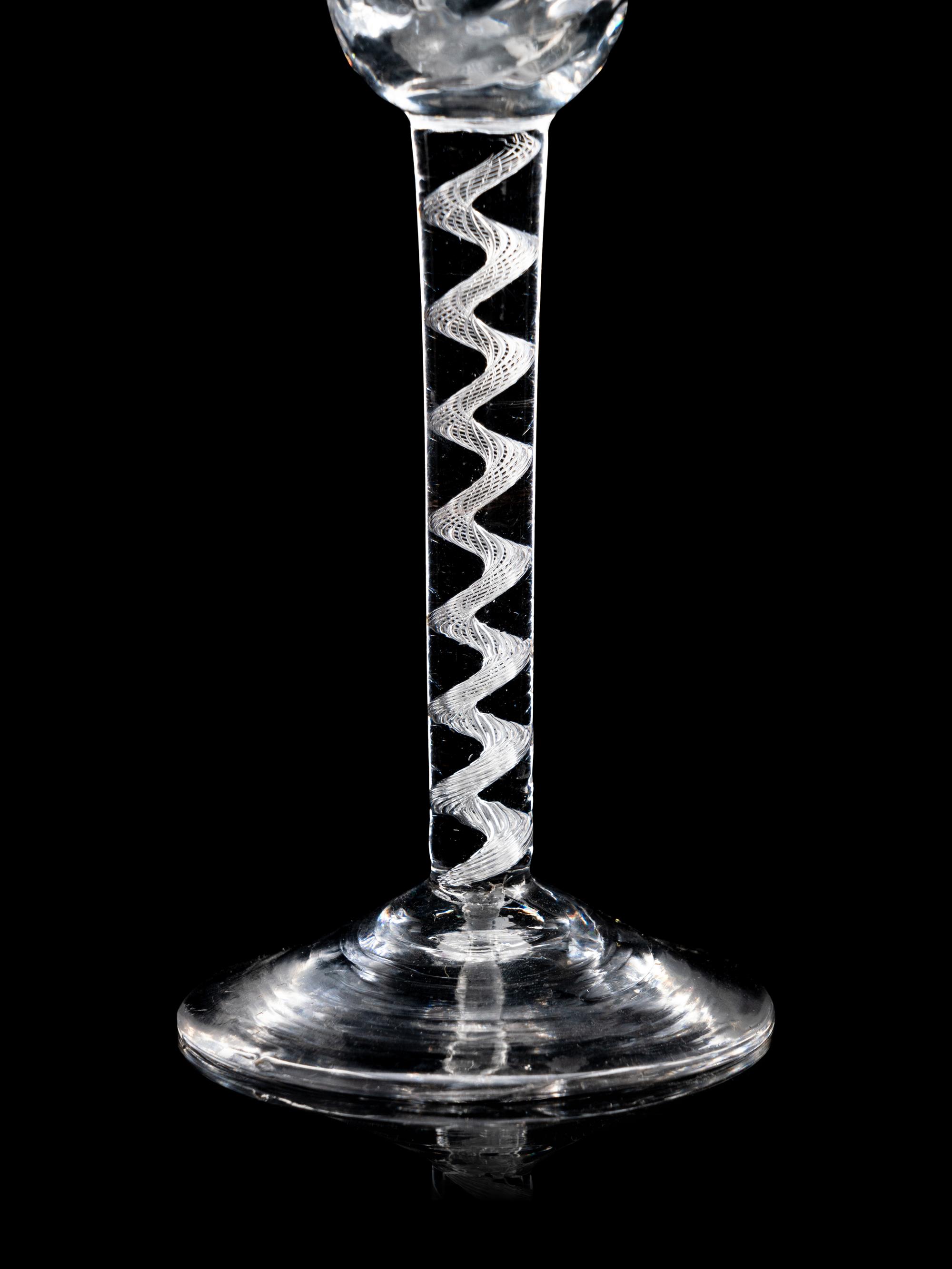 Two Moulded Glass Wine Glasses