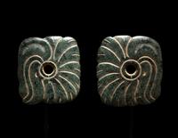 A Pair of Maya Jade Earspools in the Form of a Quetzal Bird