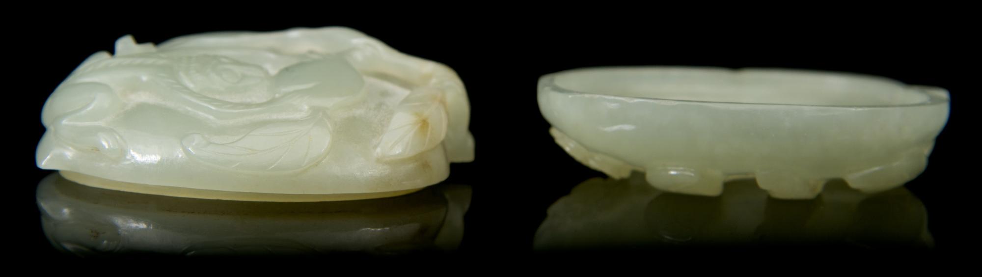 A Carved Jade Box and Cover Length 2 3/8 inches.