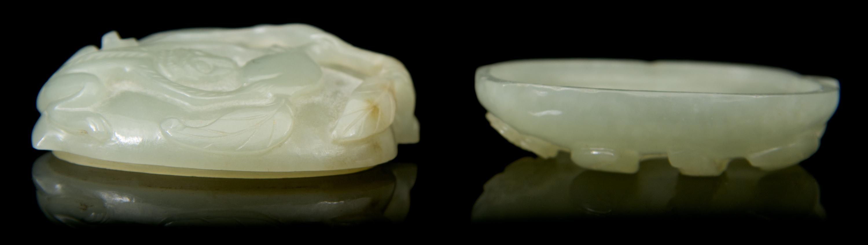 A Carved Jade Box and Cover Length 2 3/8 inches.