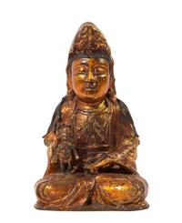 A Chinese Gilt and Black Lacquered Bronze Figure of Avalokitesvara MING DYNASTY Height 10 1/2 x width 6 3/4 inches. — MING DYNASTY