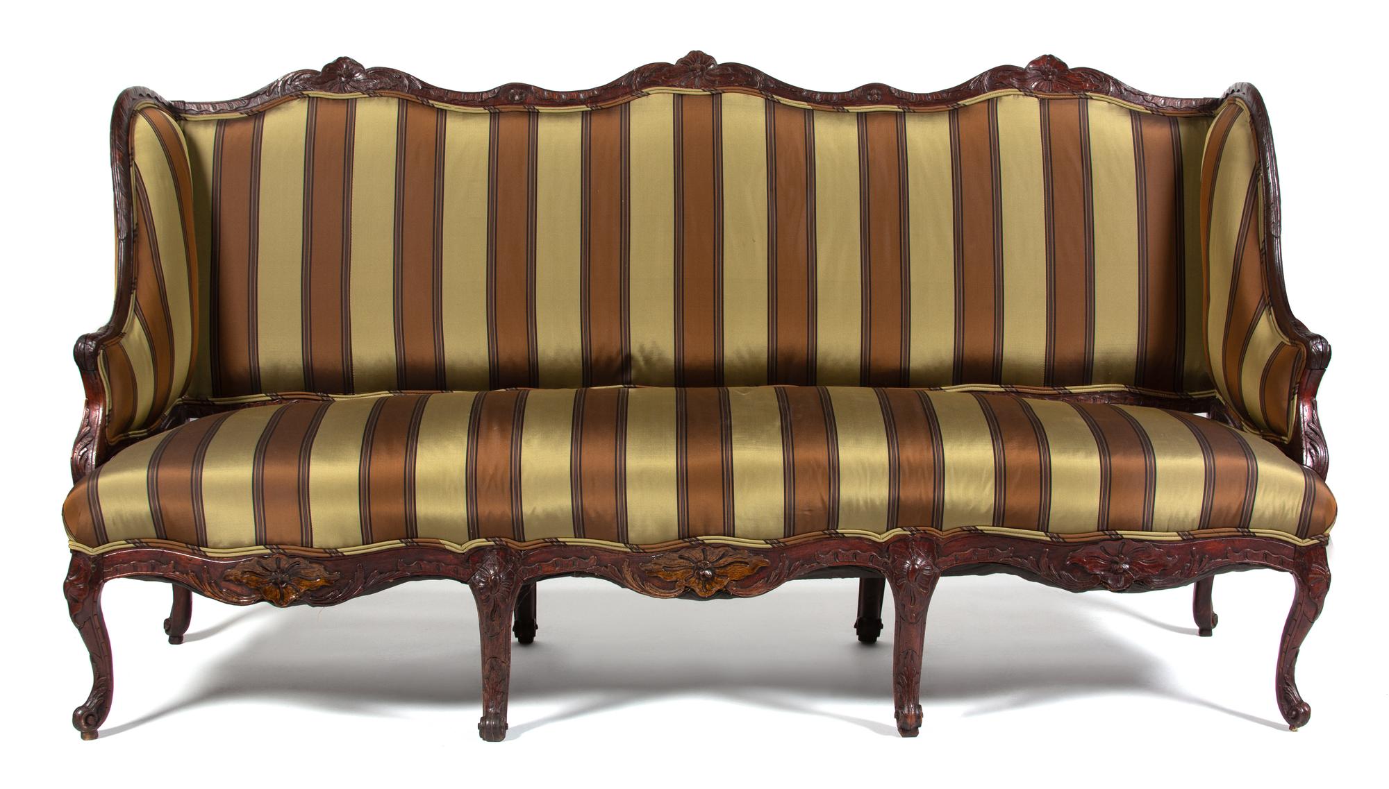 A Louis XV Style Carved Walnut Settee Height 41 1/2 x width 80 x depth 26 inches. — 19TH CENTURY