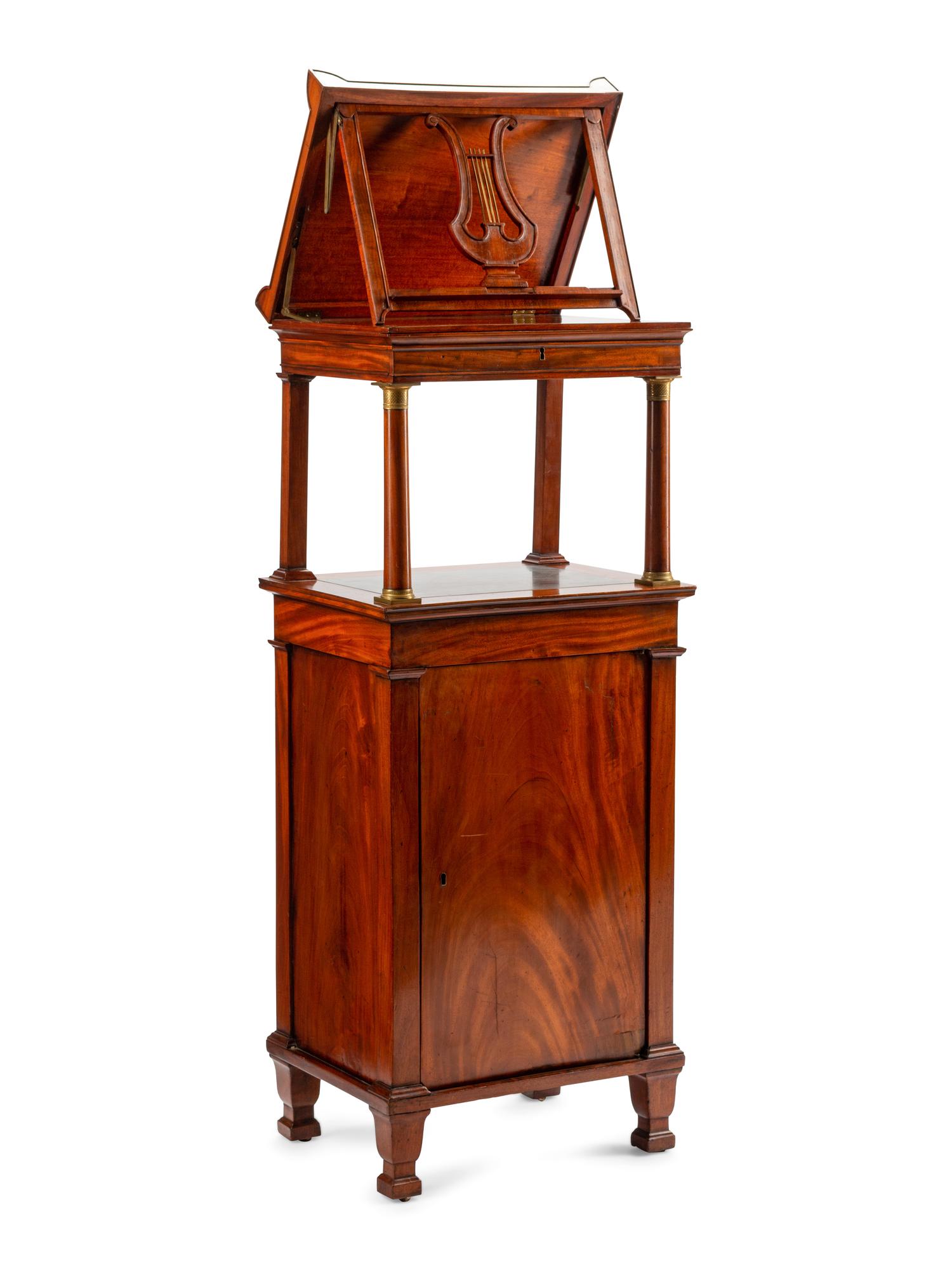 An Empire Style Mahogany and Marble-Inset Library Stand