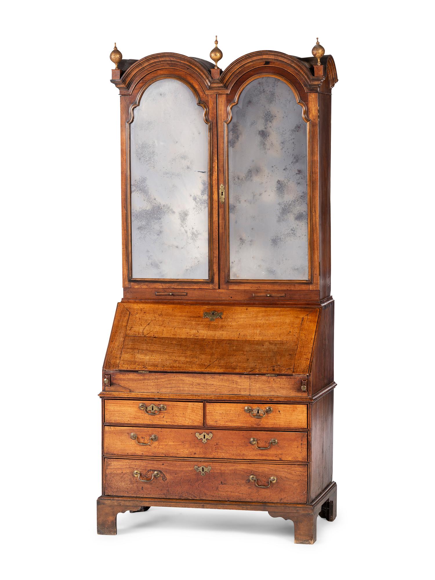 A Queen Anne Walnut Double Bonnet Secretary Bookcase
