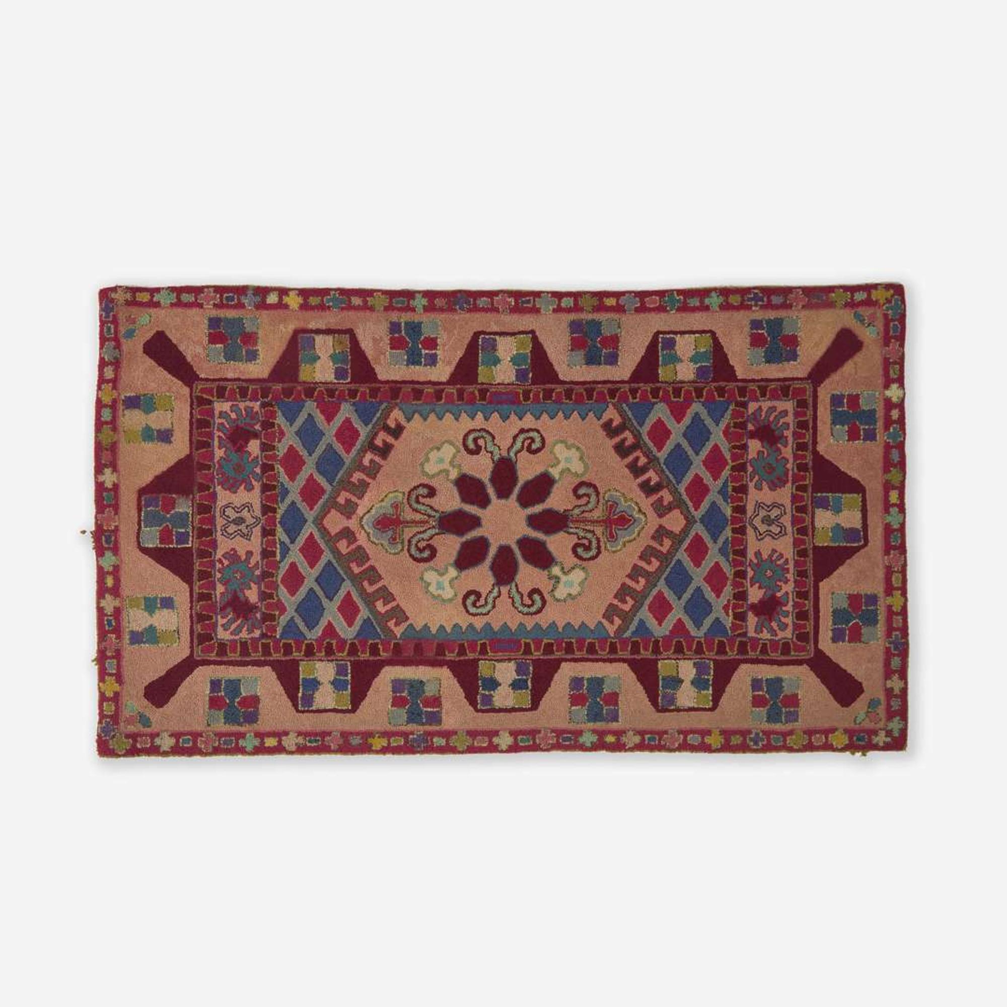 Two hooked rugs: "Cat's Paw" and "Oriental" patterns late 19th / early 20th century