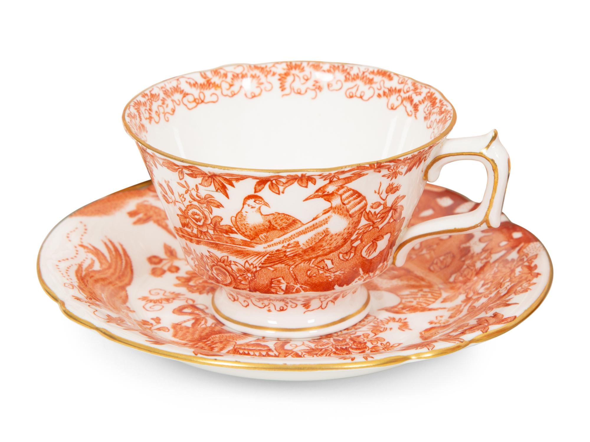 A Royal Crown Derby Red Aves Porcelain Dinner Service
