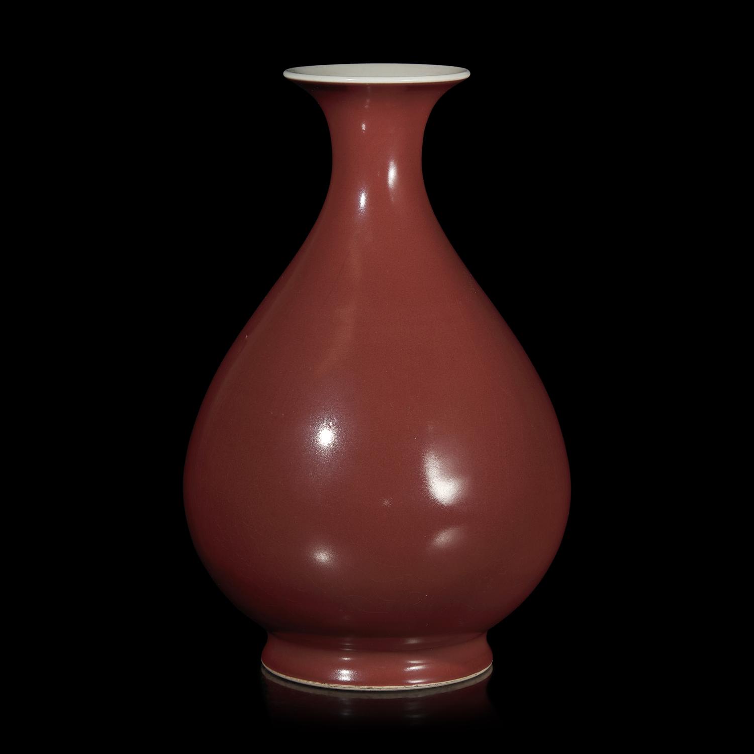 A Chinese Copper Red Glazed Pear-Shaped Vase, Yuhuchunping, Qianlong Mark and Possibly of The Period 或爲乾隆 銅紅釉玉壺春瓶