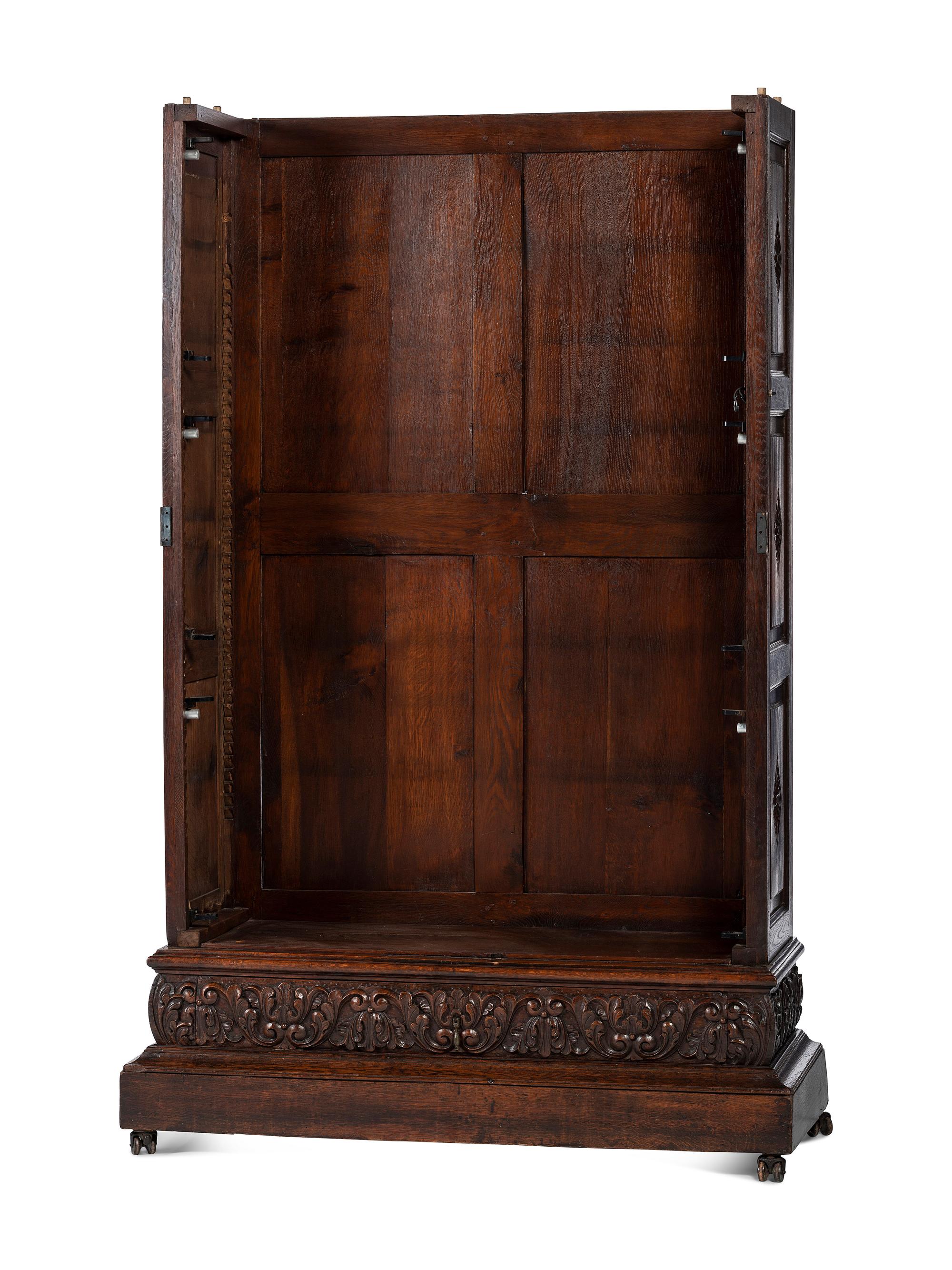 A Renaissance Revival Carved Oak Display Cabinet