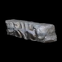 A Roman Marble Frieze Fragment with Heads of Medusa
