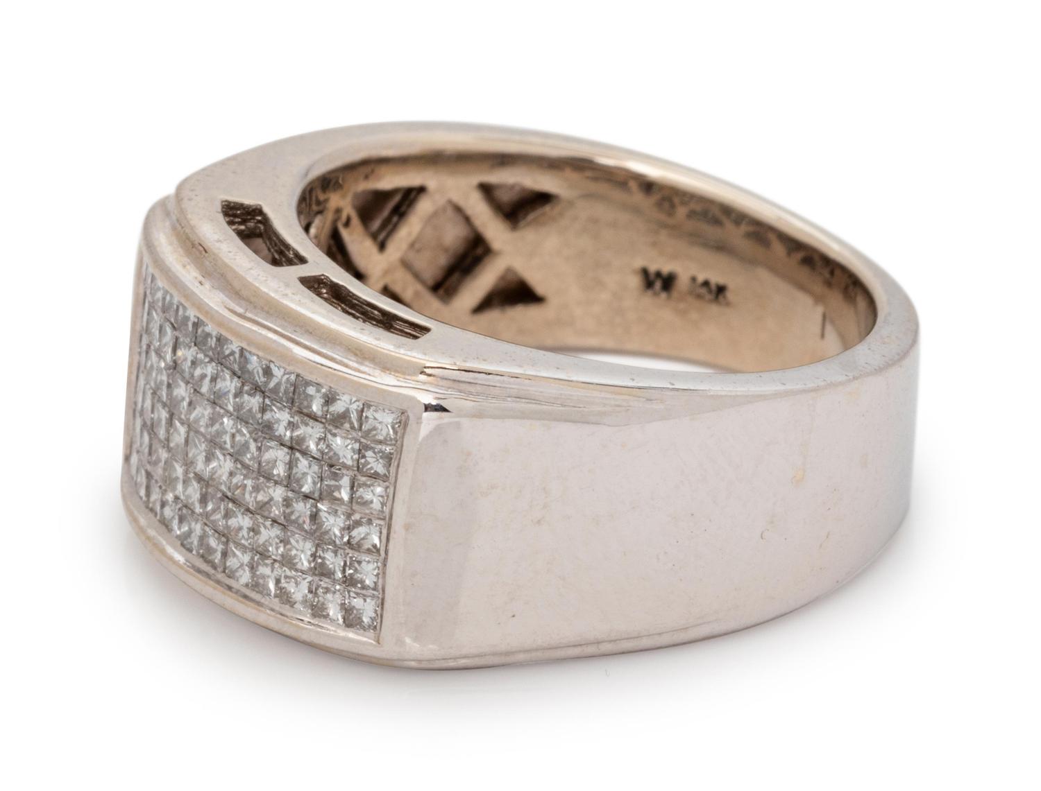 A 14 Karat White Gold and Diamond Ring,