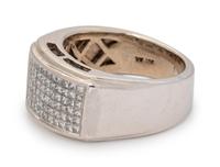 A 14 Karat White Gold and Diamond Ring,