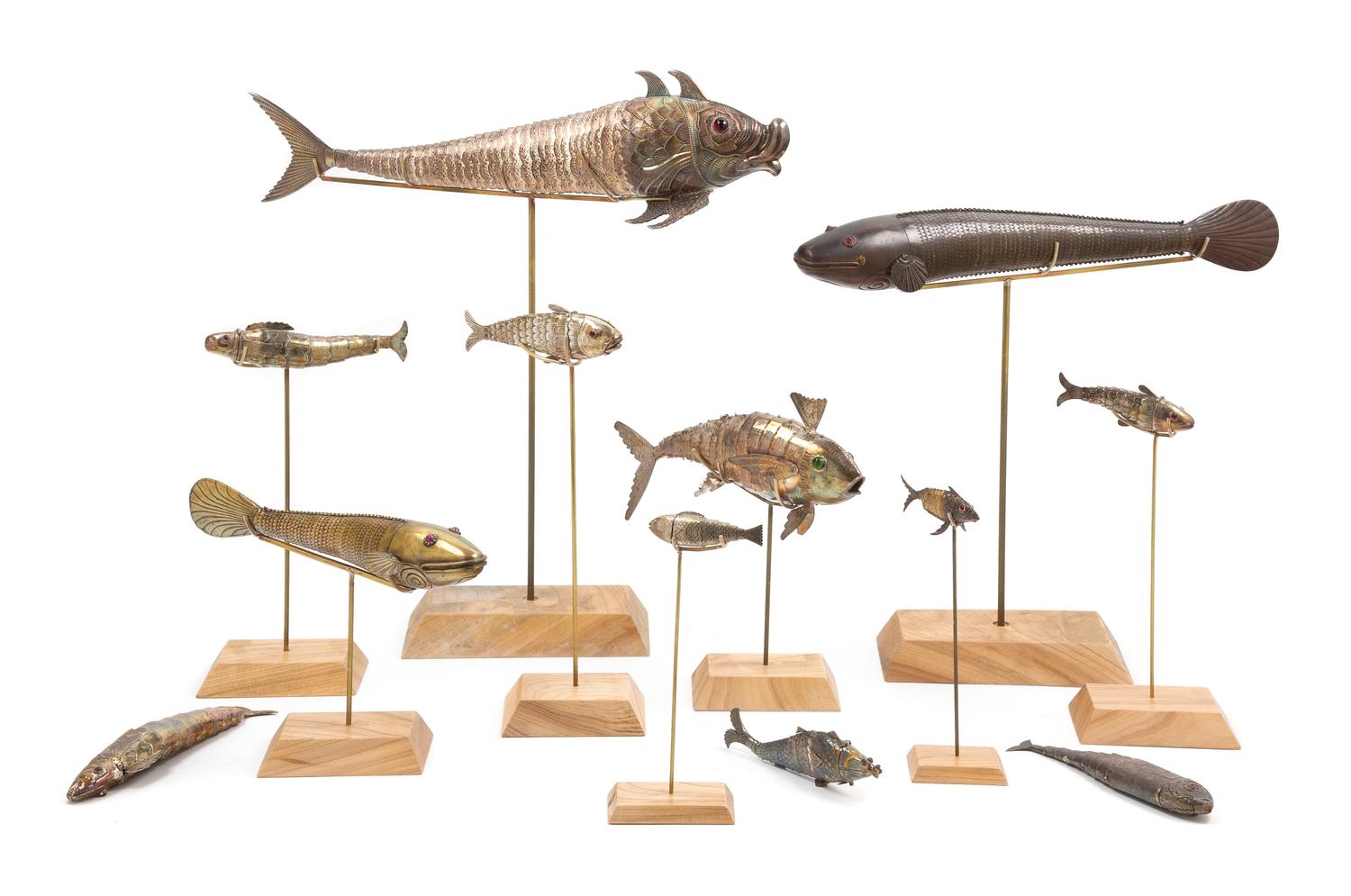 A Group of Twelve Articulated Models of Fish, Various Makers, 19th/20th Century, each with a stand, comprising an English silver vinaig