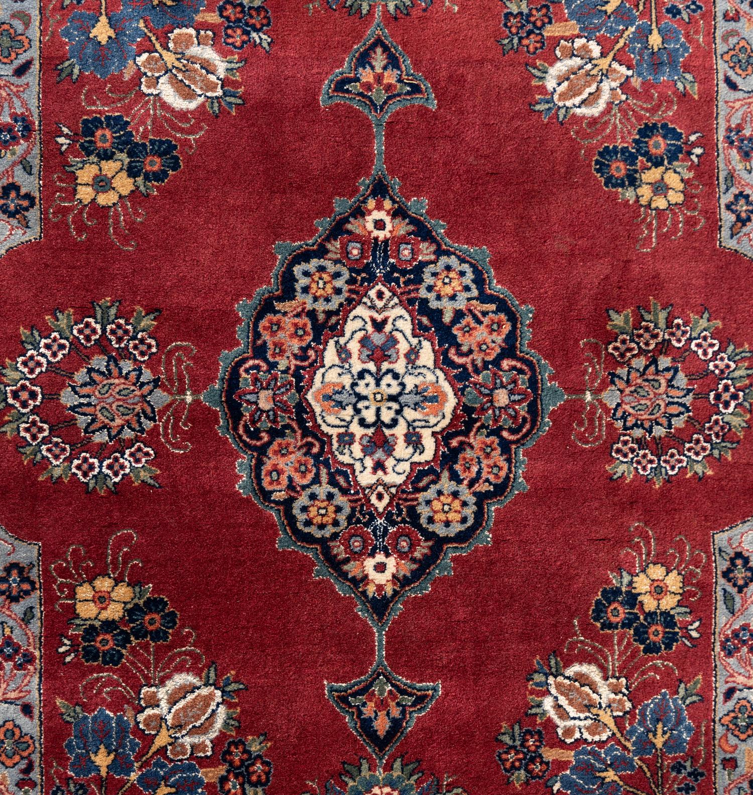 A Kashan Wool and Silk Rug