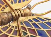 An 18K Yellow Gold and Enamel Articulated Butterfly Brooch
