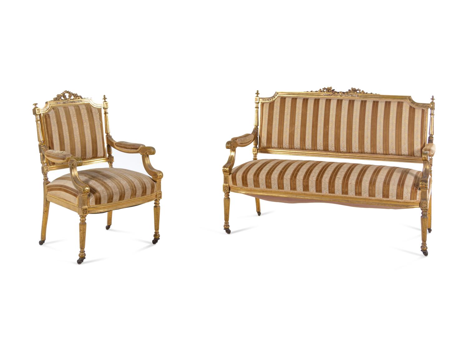 A Louis XVI Style Carved Giltwood Settee and Fauteuil