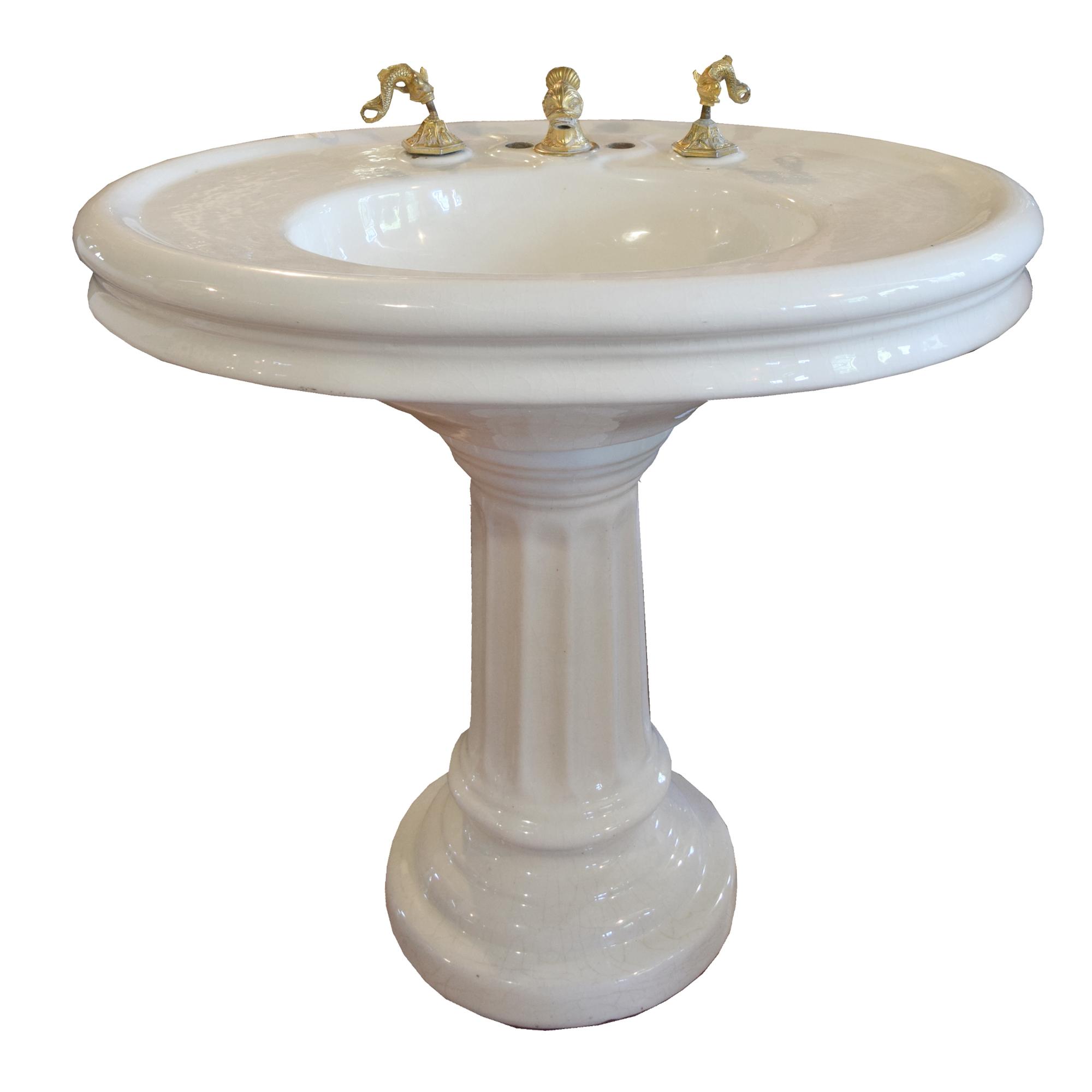 A Porcelain Pedestal Sink with Aquatic Hardware 37.5" W x 27.5" D x 32" H — United States, 20th Century