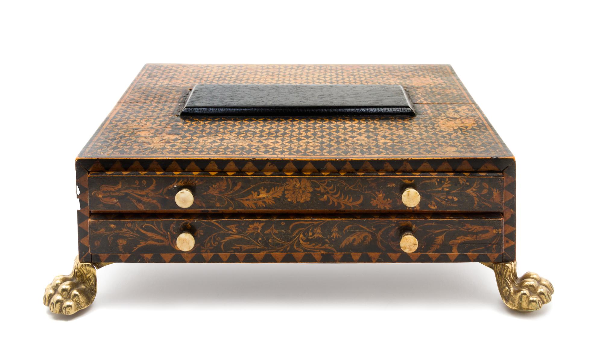 A Dutch Stenciled Sewing Box Height 3 1/2 x width 10 1/4 x depth 8 1/4 inches.